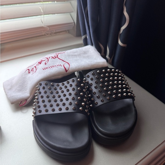 Preowned Christian Louboutin Black Slides with Silver Studs. Size 43.5.
